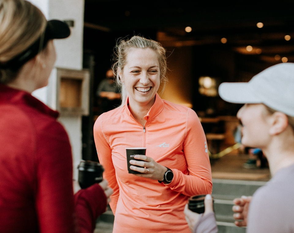 First Ascent team enoying a coffee after a run