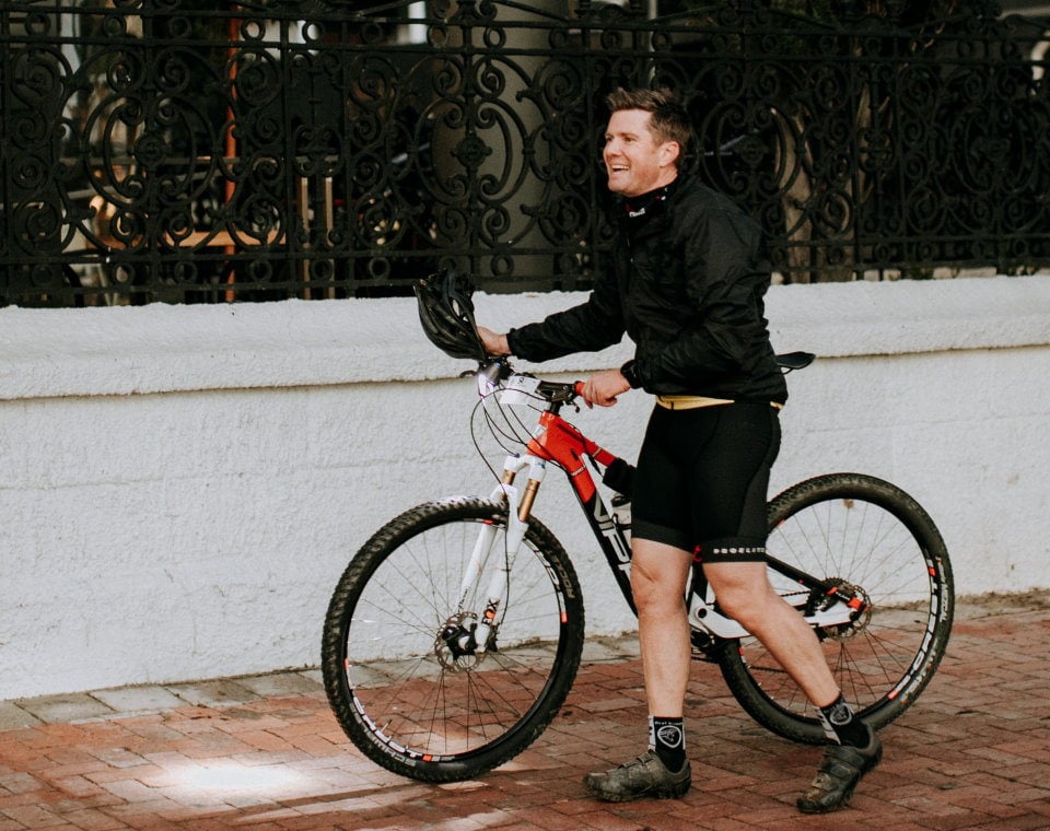 First Ascent cyclists on his way to grab a coffee