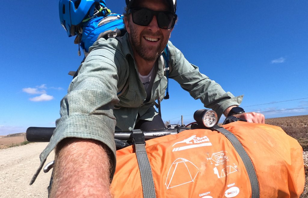 One man bikepacking with First Ascent apparel and gear